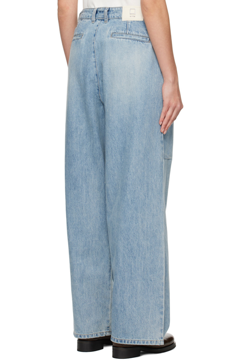Wide-leg non-stretch denim jeans. Fading throughout.

· Belt loops
· Four-pocket styling
· Zip-fly
· Logo hardware at belt loop
· Pleats at front
· Darts at knees
· Logo patch at back waistband

Supplier color: Blue