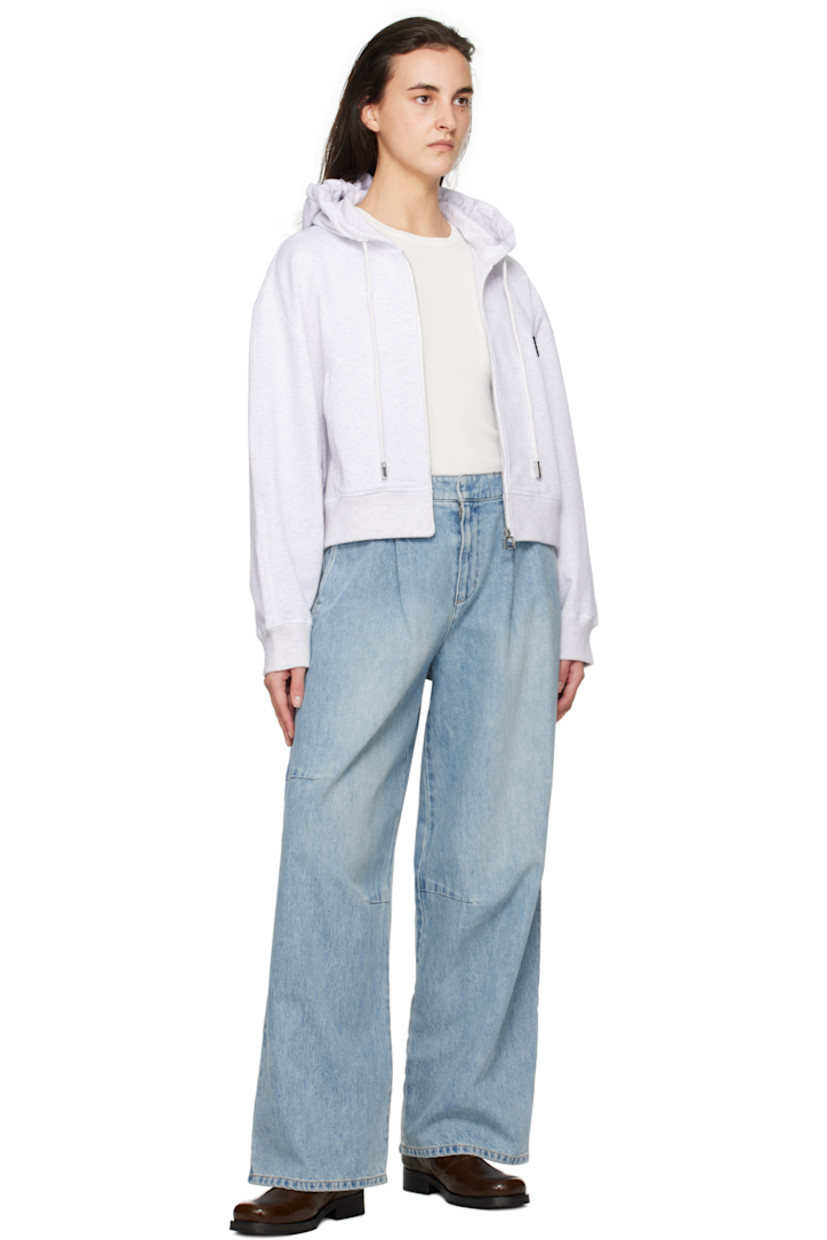 Wide-leg non-stretch denim jeans. Fading throughout.

· Belt loops
· Four-pocket styling
· Zip-fly
· Logo hardware at belt loop
· Pleats at front
· Darts at knees
· Logo patch at back waistband

Supplier color: Blue