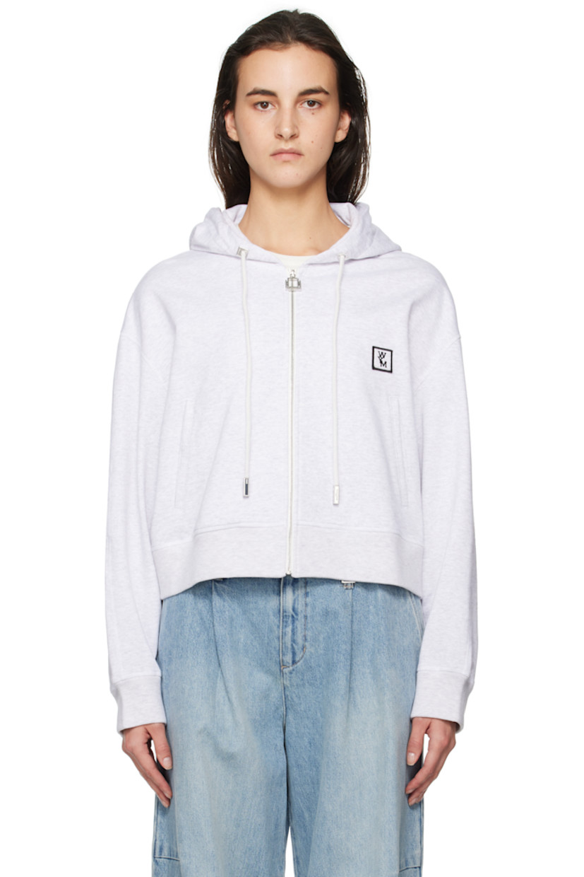 French terry hoodie.

· Drawstring at hood
· Zip closure
· Embroidered logo patch at chest
· Welt pockets
· Rib-knit hem and cuffs
· Dropped shoulders
· Logo hardware at back collar
· Logo printed at back

Supplier color: Grey