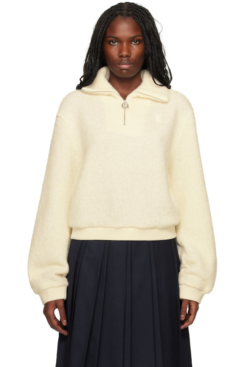 Brushed knit polyester-blend sweatshirt.

· Spread collar
· Half-zip closure
· Embroidered logo patch at chest
· Rib-knit hem and cuffs
· Dropped shoulders
· Logo hardware at back

Supplier color: White