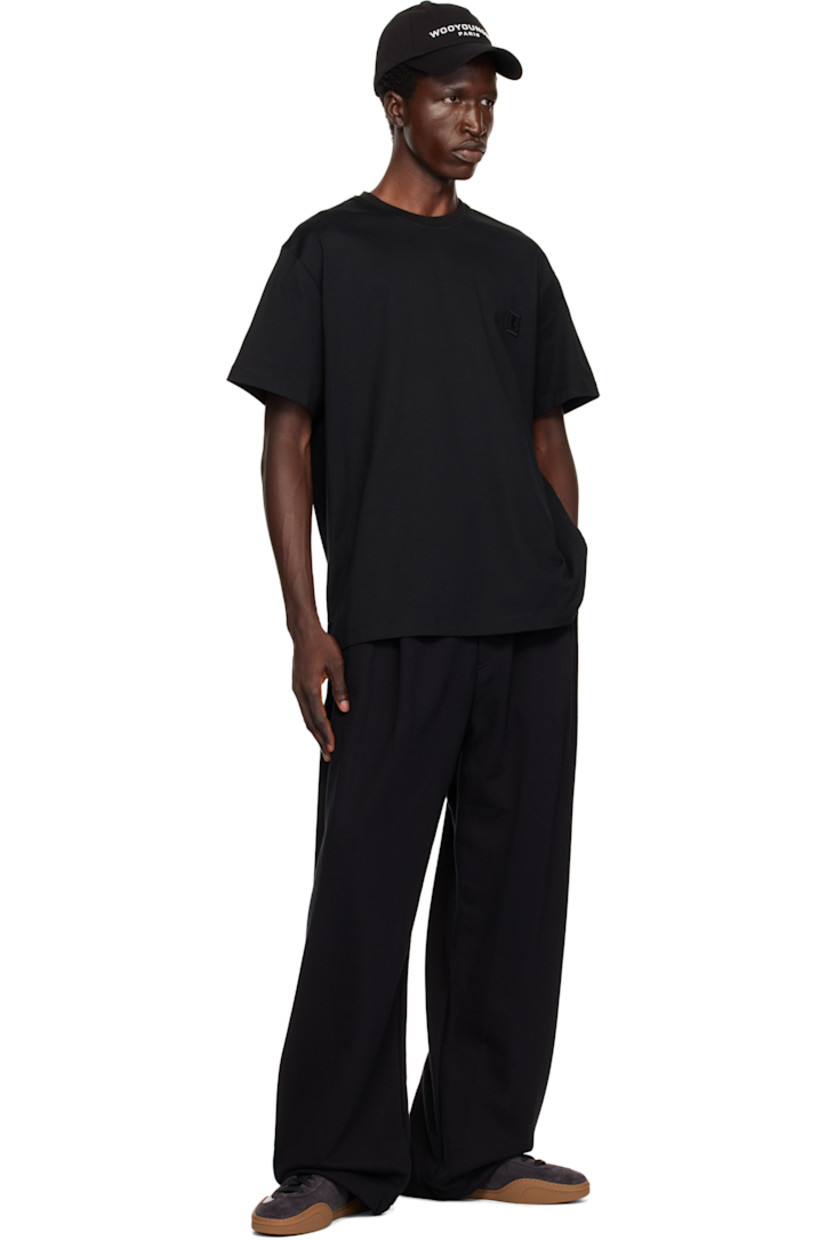 French terry sweatshirt.

· Rib-knit crewneck
· Logo patch at chest
· Vented side seams
· Logo hardware at back collar
· Logo graphic bonded at back

Supplier color: Black