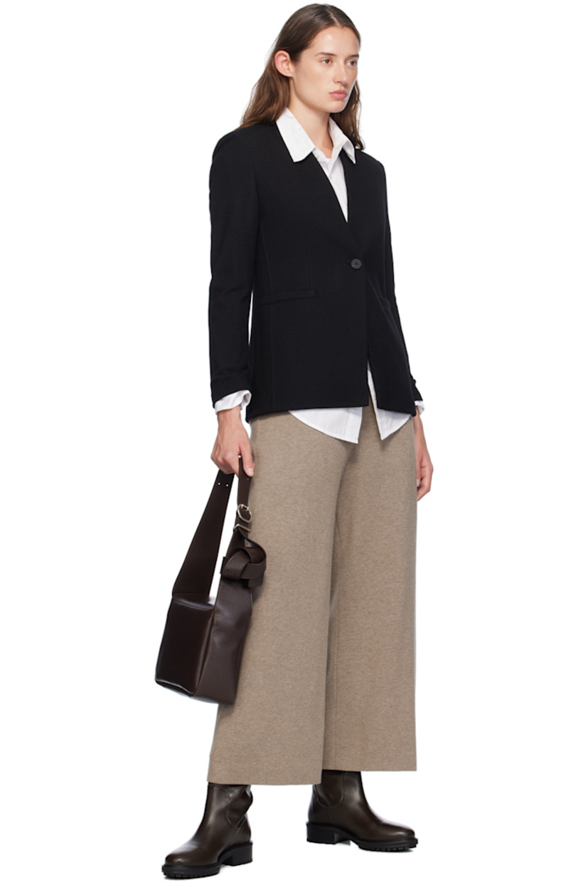 Oversized mulesing-free virgin wool melton blazer.

· Y-neck
· Single-button closure 
· Patch pockets 
· Padded shoulders

Supplier color: Black