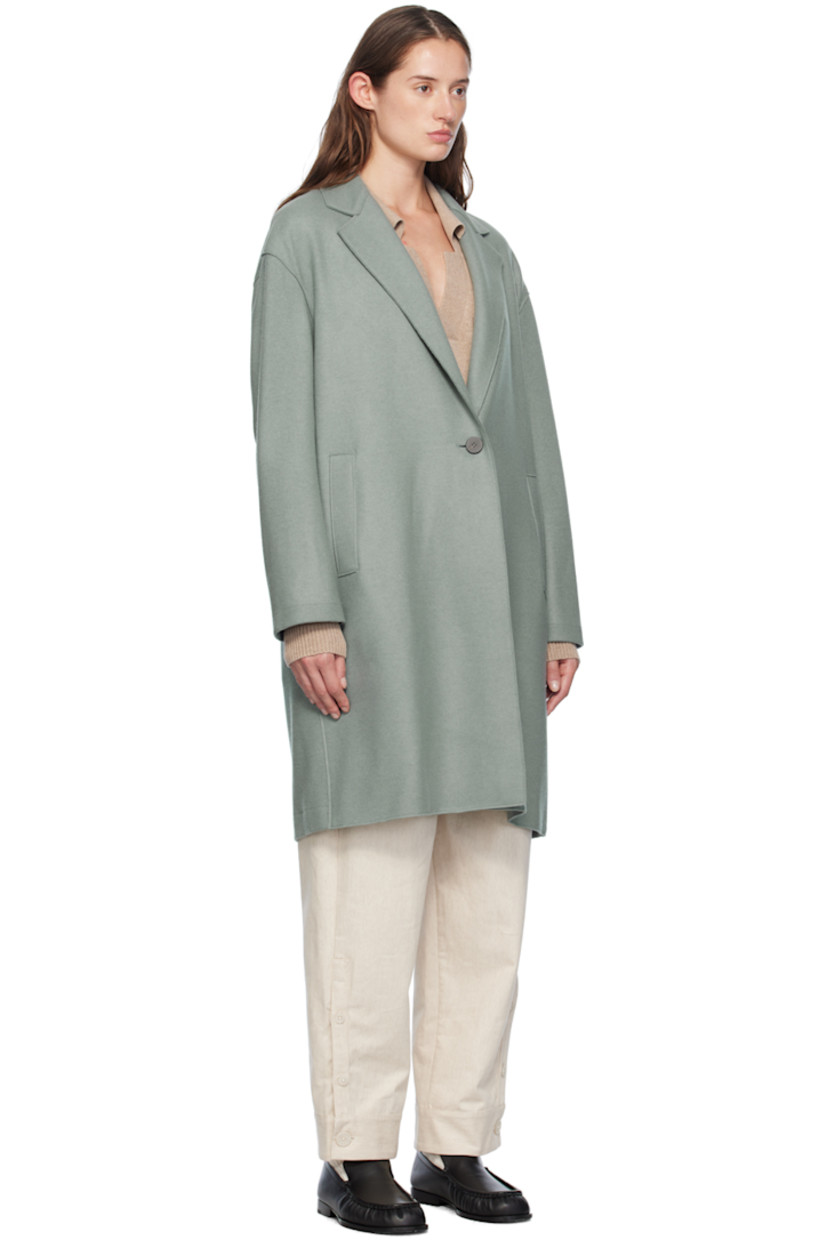 Oversized mulesing-free virgin wool- and silk-blend melton coat. Raw edges throughout. 

· Notched lapel
· Button closure
· Welt pockets
· Dropped shoulders
· Unlined

Supplier color: Sage green