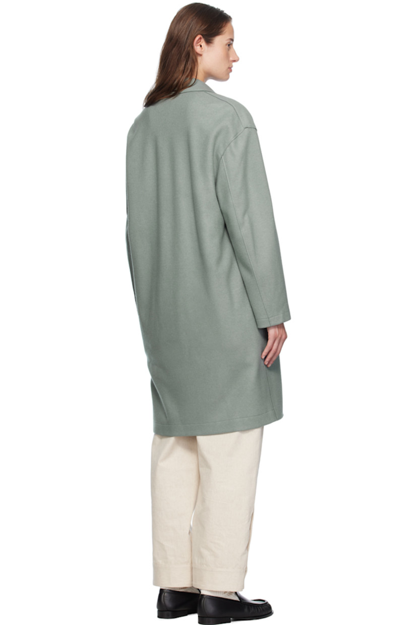 Oversized mulesing-free virgin wool- and silk-blend melton coat. Raw edges throughout. 

· Notched lapel
· Button closure
· Welt pockets
· Dropped shoulders
· Unlined

Supplier color: Sage green