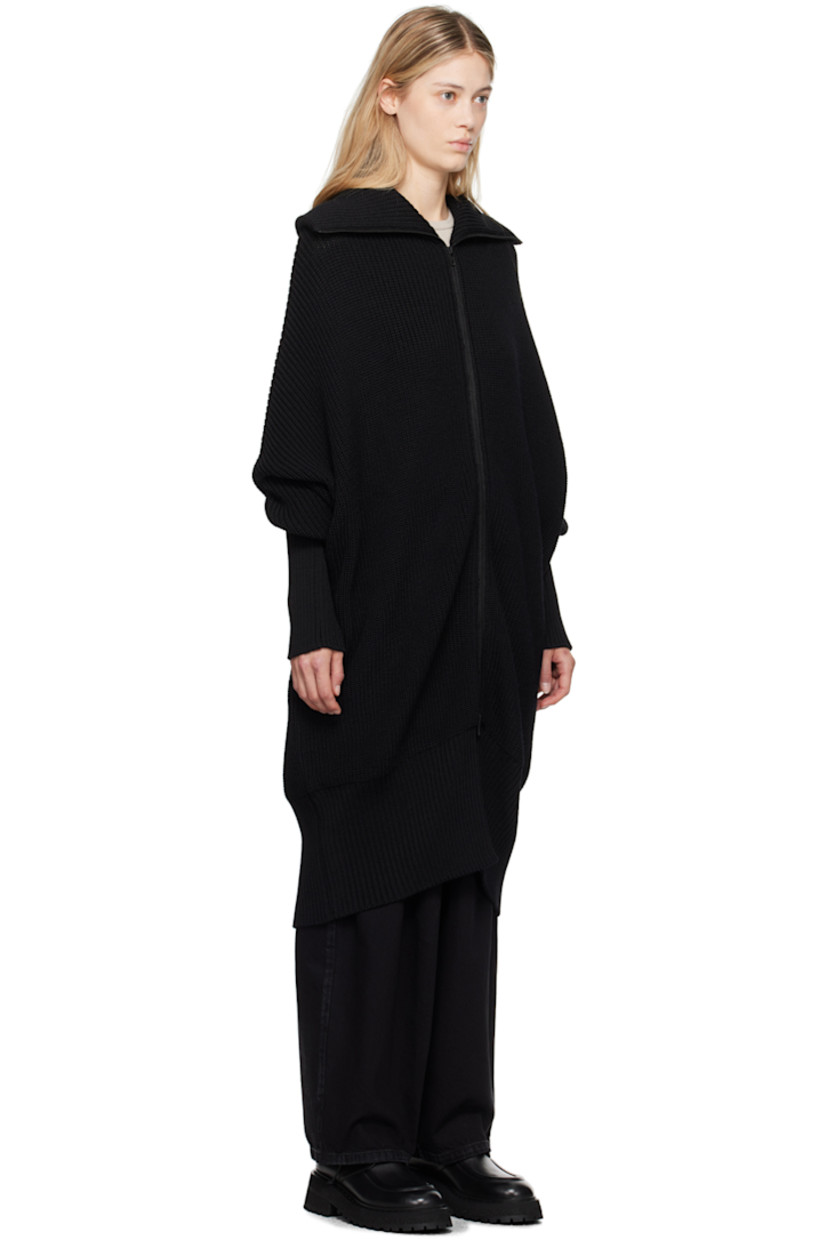 Rib knit wool cardigan.

· Turtleneck
· Two-way zip closure 
· Seam pockets
· Dropped shoulders

Supplier color: Black