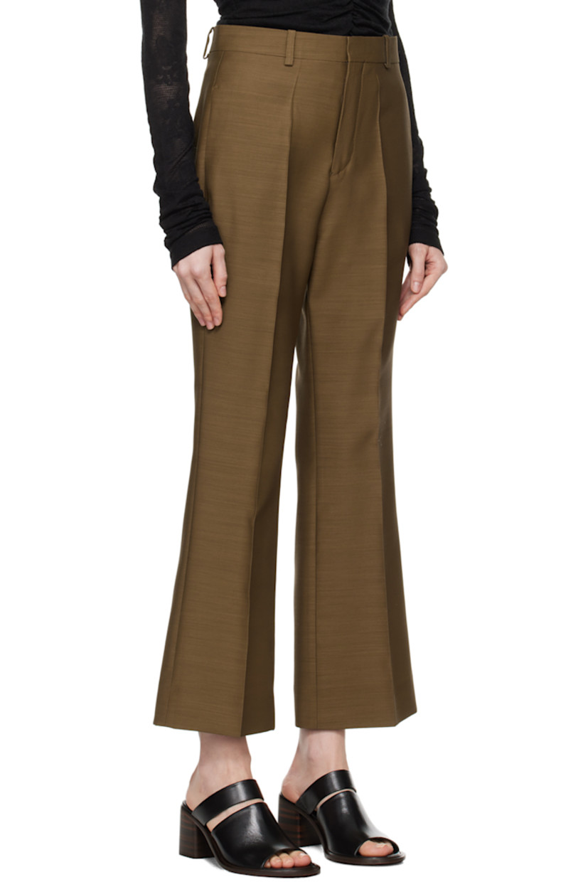 Flared RWS-certified wool- and organic silk-blend duck cloth trousers.

· Belt loops
· Four-pocket styling
· Zip-fly
· Creased legs
· Cropped cuffs

Supplier color: Moss