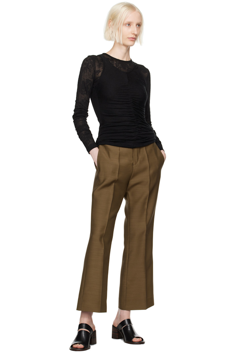 Flared RWS-certified wool- and organic silk-blend duck cloth trousers.

· Belt loops
· Four-pocket styling
· Zip-fly
· Creased legs
· Cropped cuffs

Supplier color: Moss