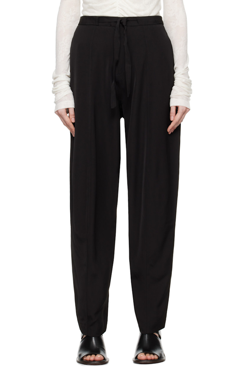 Loose-fit tapered viscose satin trousers.

· Integrated self-tie belt
· Four-pocket styling
· Zip-fly

Supplier color: Black