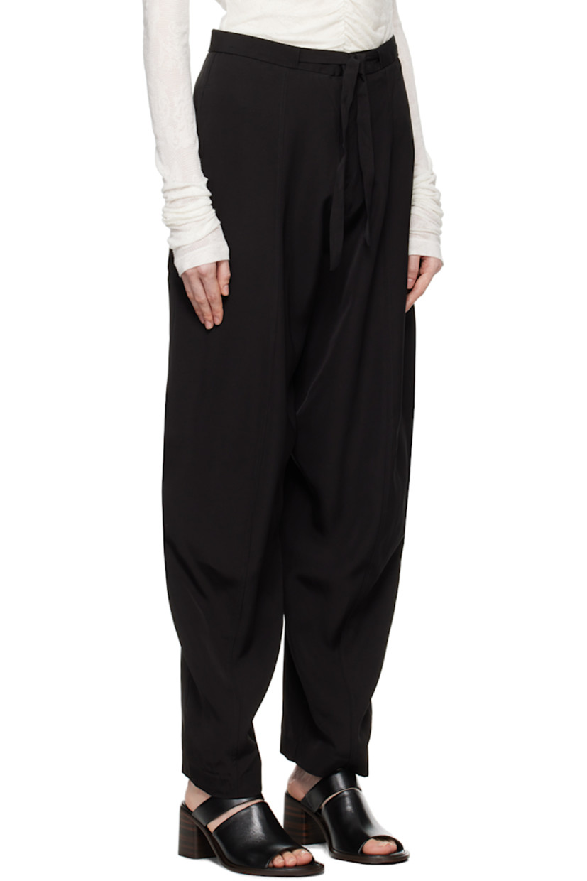 Loose-fit tapered viscose satin trousers.

· Integrated self-tie belt
· Four-pocket styling
· Zip-fly

Supplier color: Black