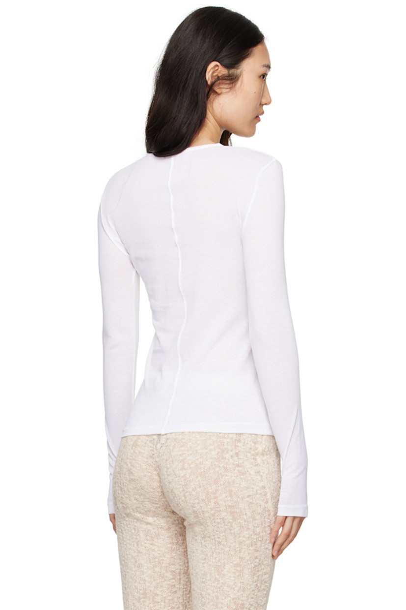 Semi-sheer knit organic cotton T-shirt. 

· Crewneck
· Thumbhole at cuffs
· Central seam at back 

Supplier color: White