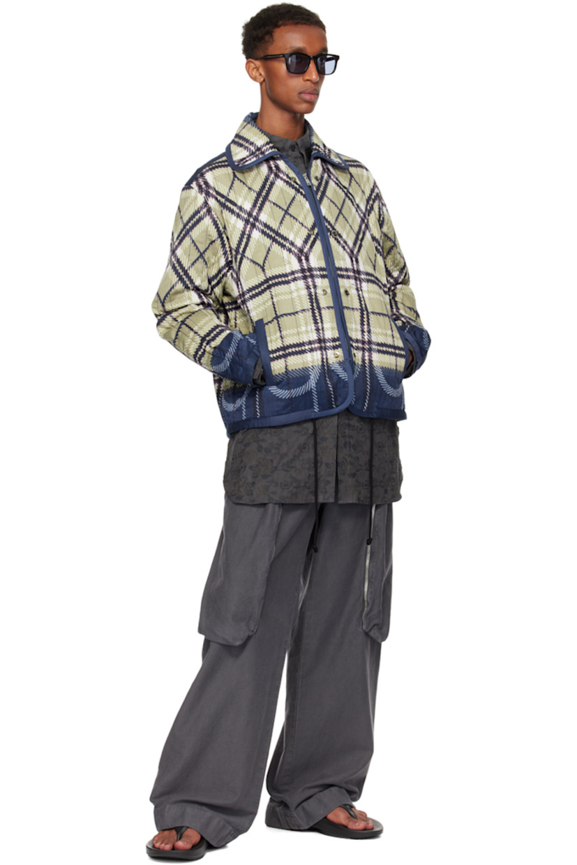 Quilted cotton poplin jacket. Hand-printed check pattern throughout. 

· Spread collar
· Zip closure
· Exposed press-stud placket 
· Press-stud hardware at front
· Welt pockets
· Drawstring at hem
· Press-stud fastening at cuffs
· Welt pocket at interior
· Satin lining 
· Logo-engraved silver-tone hardware

Supplier color: Beige plaid