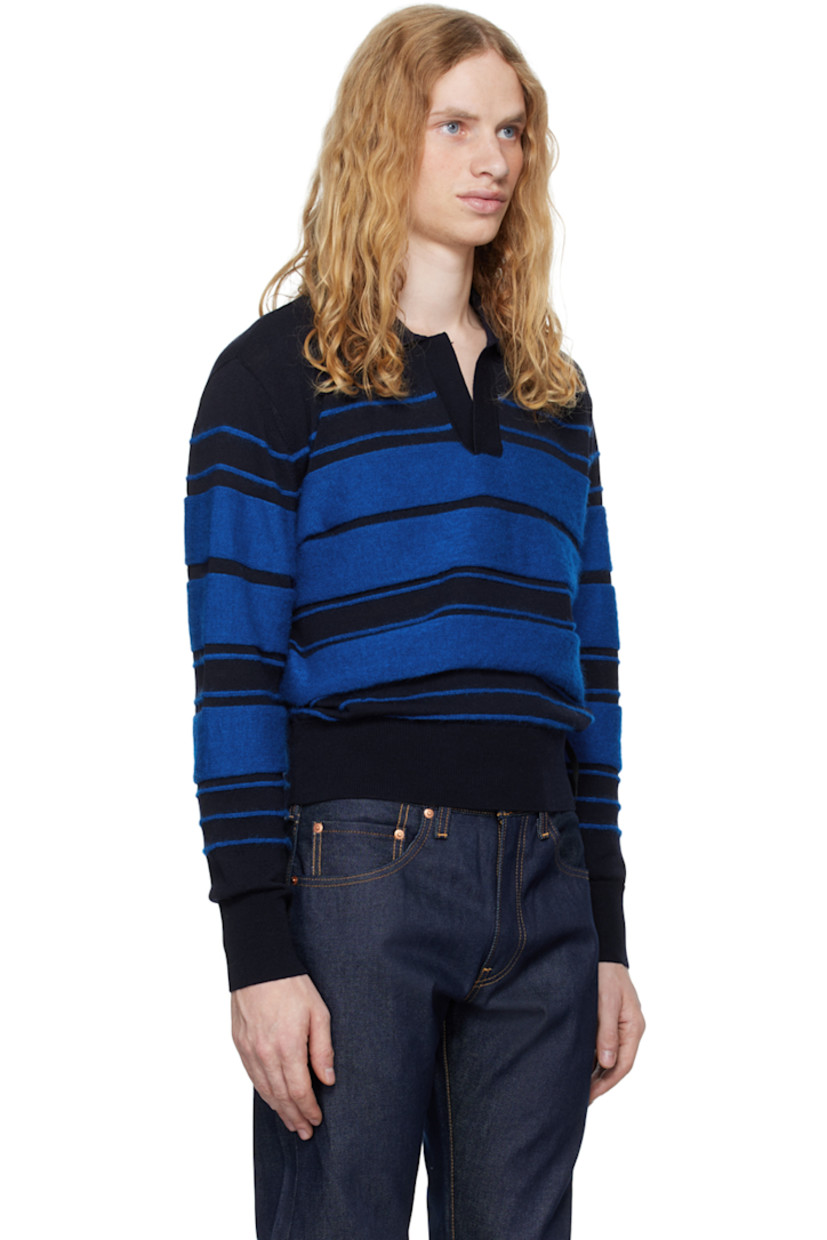 Knit wool- and mohair-blend polo. Stripes throughout.

· Rib knit spread collar, hem, and cuffs
· Open placket
· Logo flag at hem

Supplier color: Dark blue/Blue