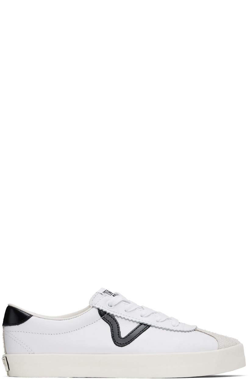 Low-top suede and buffed leather sneakers in white.

· Serrated detailing at lace-up closure
· Logo patch at padded tongue
· Grained leather Sidestripe™ at outer side
· Padded Sola ADC foam footbed
· Grained leather lining
· Rubberized logo patch at heel
· Treaded rubber sole

Supplier color: Black