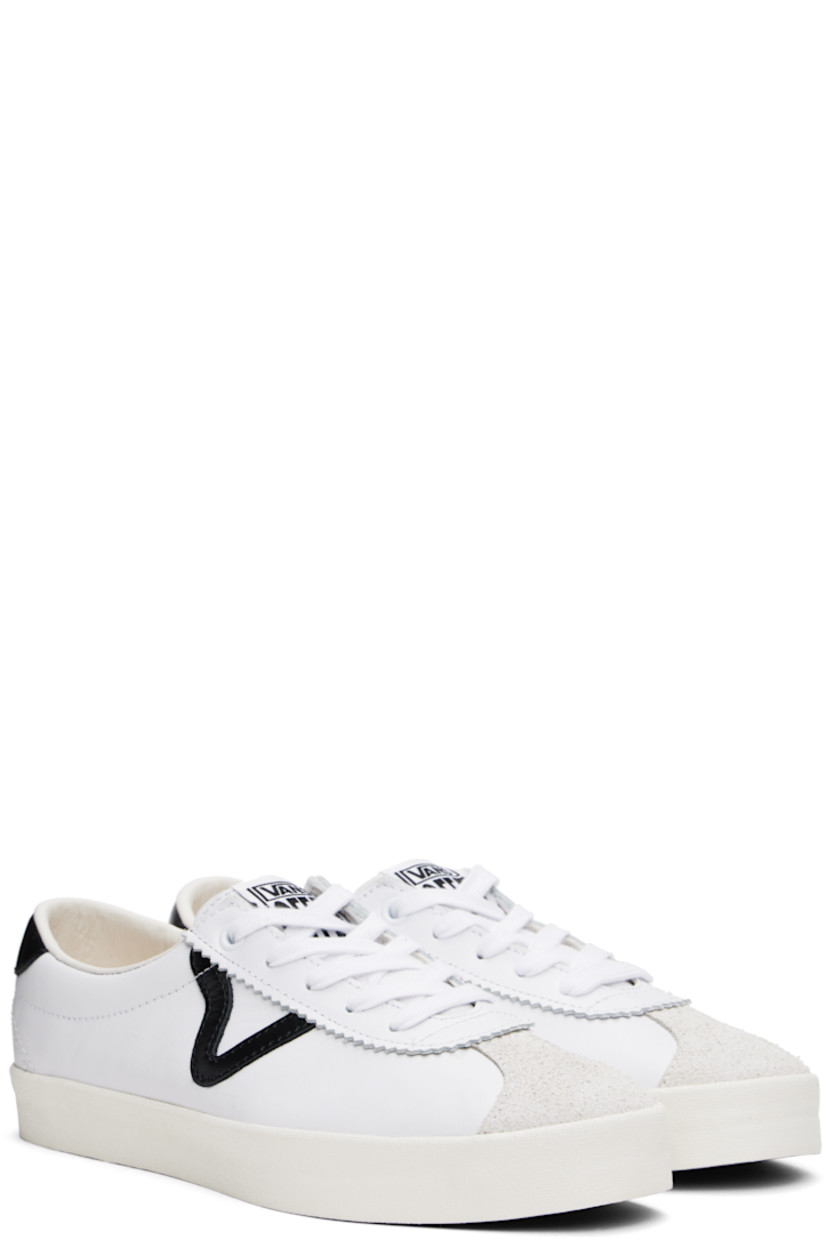 Low-top suede and buffed leather sneakers in white.

· Serrated detailing at lace-up closure
· Logo patch at padded tongue
· Grained leather Sidestripe™ at outer side
· Padded Sola ADC foam footbed
· Grained leather lining
· Rubberized logo patch at heel
· Treaded rubber sole

Supplier color: Black