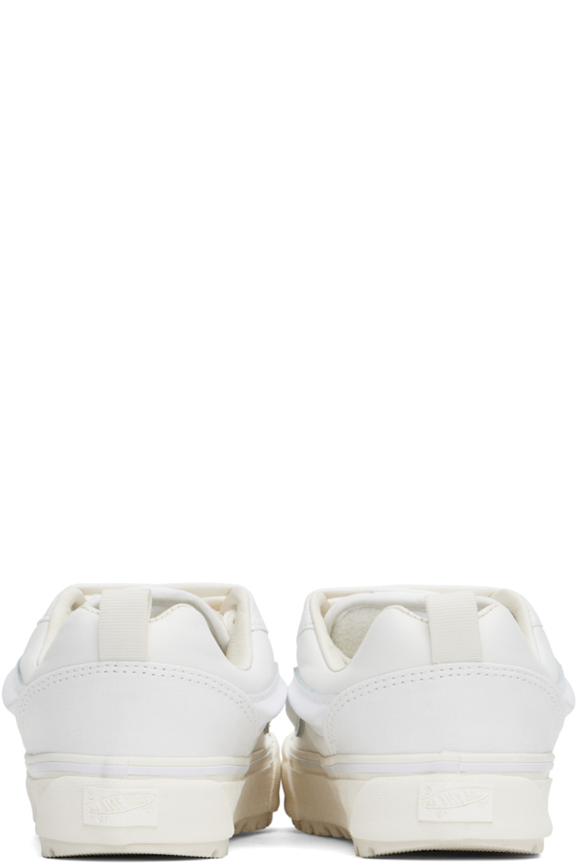 Low-top Primaloft®-insulated canvas and taffeta sneakers in white.

· Lace-up closure
· Logo patch at padded tongue
· Padded collar
· Molded grained leather Sidestripe™
· Pull-loop at heel
· Padded insole
· Buffed leather lining
· Rubberized logo patch at heel midsole
· Lugged rubber sole

Supplier color: Mercer white