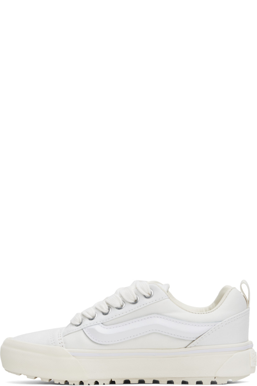 Low-top Primaloft®-insulated canvas and taffeta sneakers in white.

· Lace-up closure
· Logo patch at padded tongue
· Padded collar
· Molded grained leather Sidestripe™
· Pull-loop at heel
· Padded insole
· Buffed leather lining
· Rubberized logo patch at heel midsole
· Lugged rubber sole

Supplier color: Mercer white