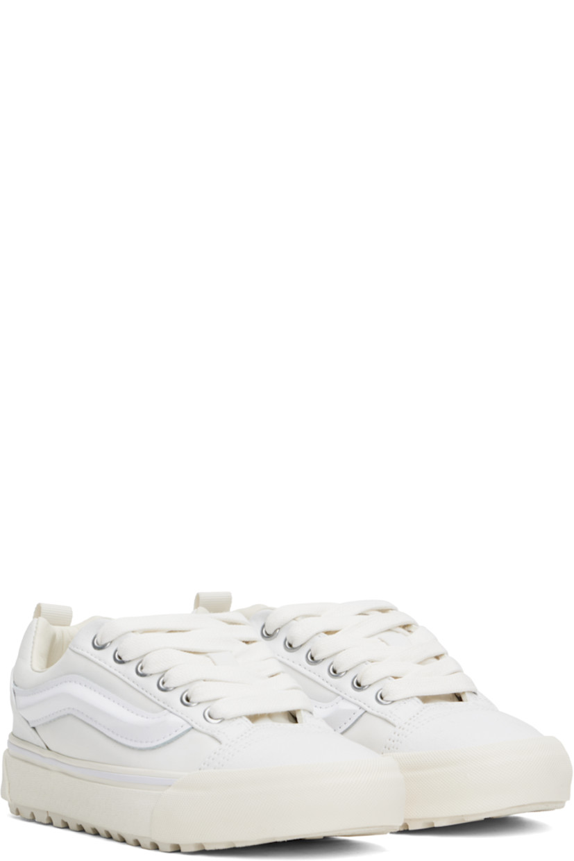 Low-top Primaloft®-insulated canvas and taffeta sneakers in white.

· Lace-up closure
· Logo patch at padded tongue
· Padded collar
· Molded grained leather Sidestripe™
· Pull-loop at heel
· Padded insole
· Buffed leather lining
· Rubberized logo patch at heel midsole
· Lugged rubber sole

Supplier color: Mercer white