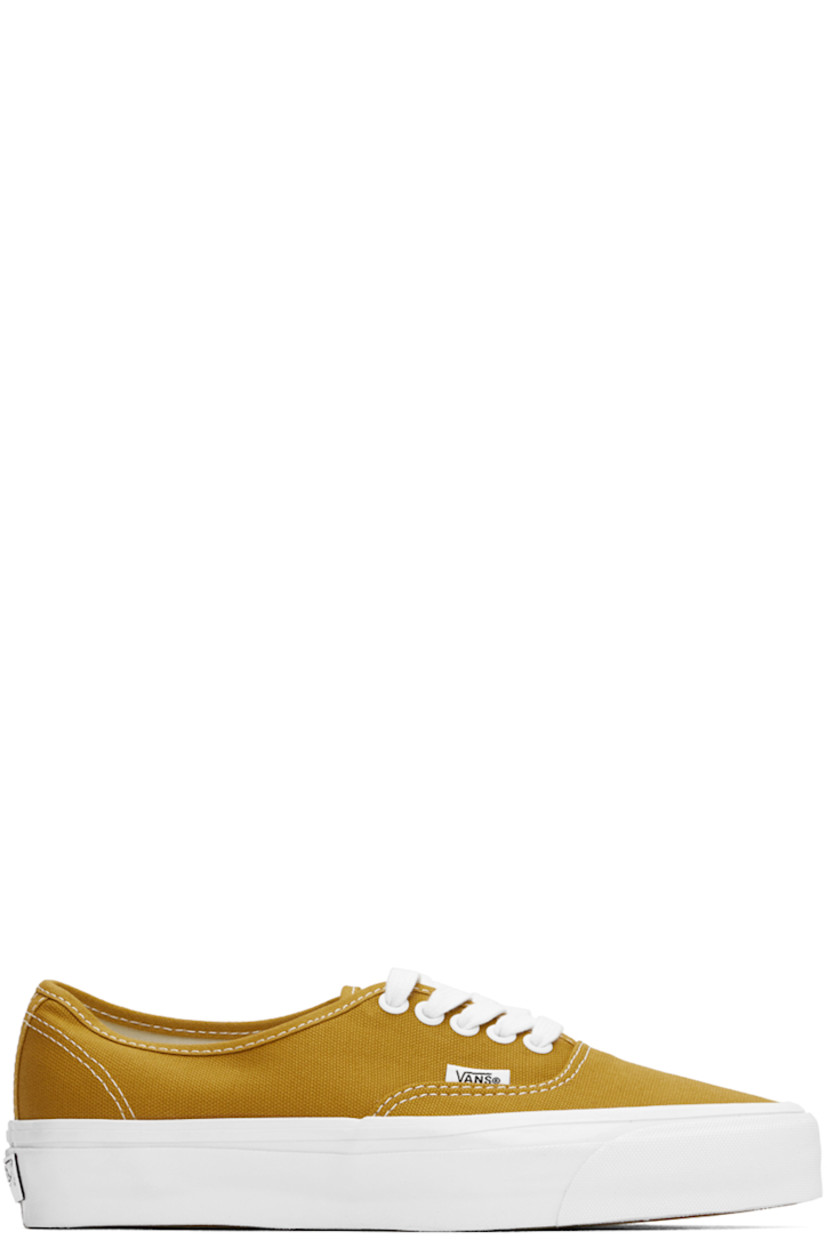 Low-top 8 oz canvas sneakers in yellow.

· Lace-up closure
· Logo flag at outer side
· Extended rubber welt
· Padded Sola Foam ADC rubber insole
· Rubberized logo patch at heel midsole
· Treaded rubber sole
· Contrast stitching in white 

Supplier color: Harvest gold