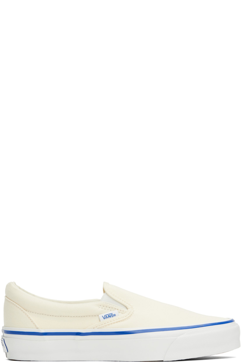 Low-top 8 oz canvas slip-on sneakers in off-white.

· Elasticized gussets at vamp
· Padded collar
· Logo flag at outer side
· Rubber logo patch at heel
· Partial grained leather and canvas lining
· Textured rubber midsole
· Treaded rubber sole

Supplier color: Lx off white