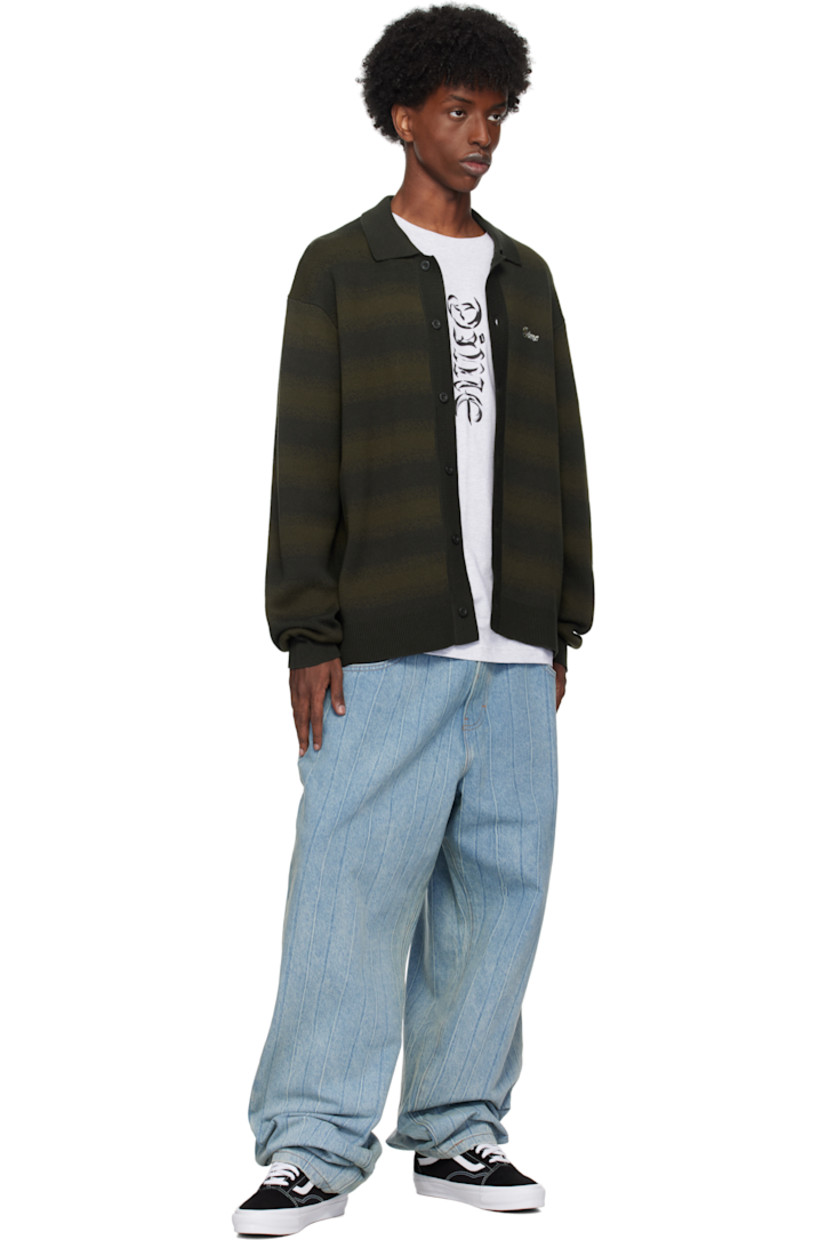 Low-top 8 oz canvas and suede sneakers in black.

· Lace-up closure
· Padded tongue and collar
· Grained leather Sidestripe™ 
· Padded Sola ADC foam footbed
· Buffed leather lining
· Rubberized logo patch at heel midsole
· Treaded rubber sole
· Contrast stitching in white

Supplier color: Black/White