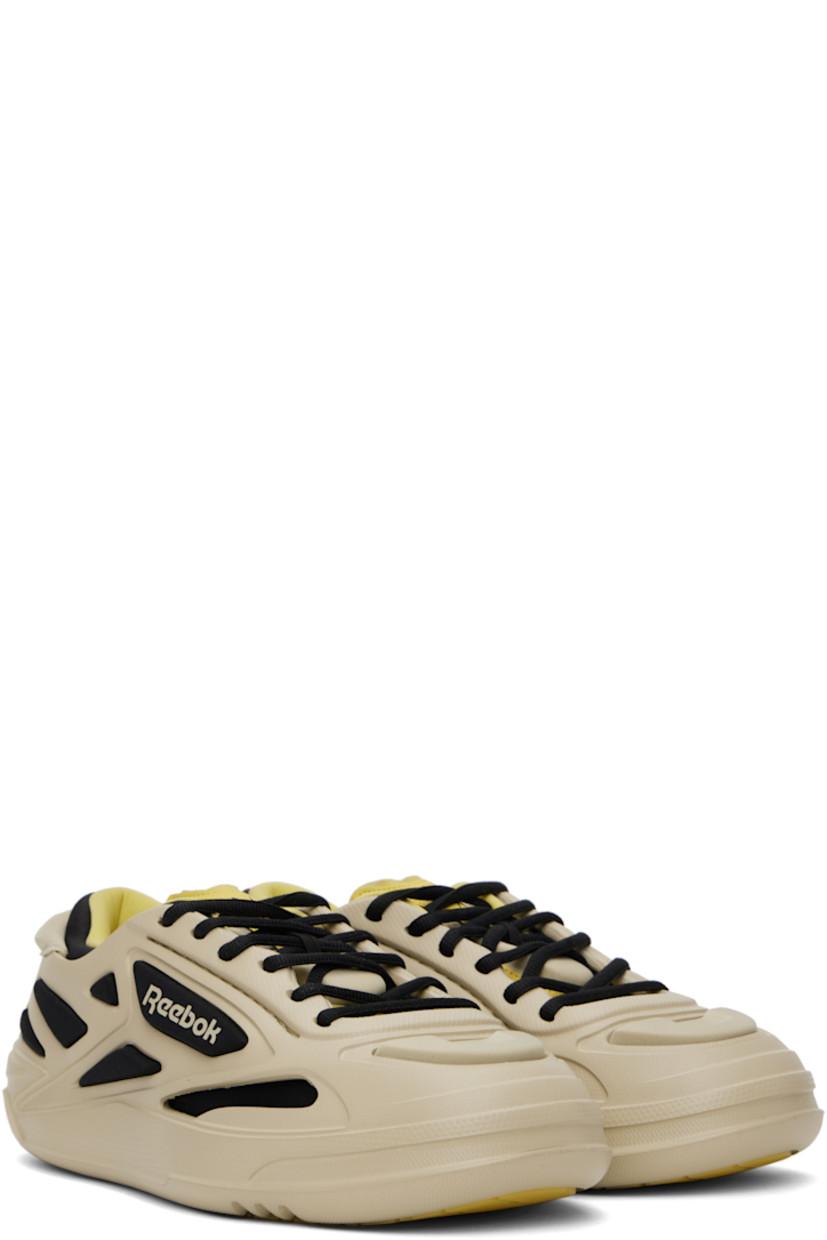 Low-top layered textured rubber and jersey sneakers in khaki and black. 

· Lace-up closure
· Padded collar
· Logo printed at heel tab and outer side
· Jersey lining
· Treaded rubber sole

Supplier color: Kakhi/Caviar