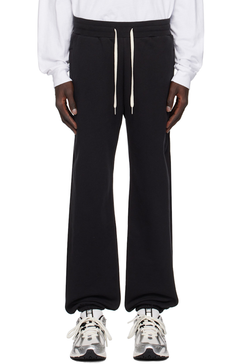 French terry sweatpants.

· Drawstring at elasticized waistband
· Three-pocket styling
· Elasticized cuffs 

Supplier color: Black