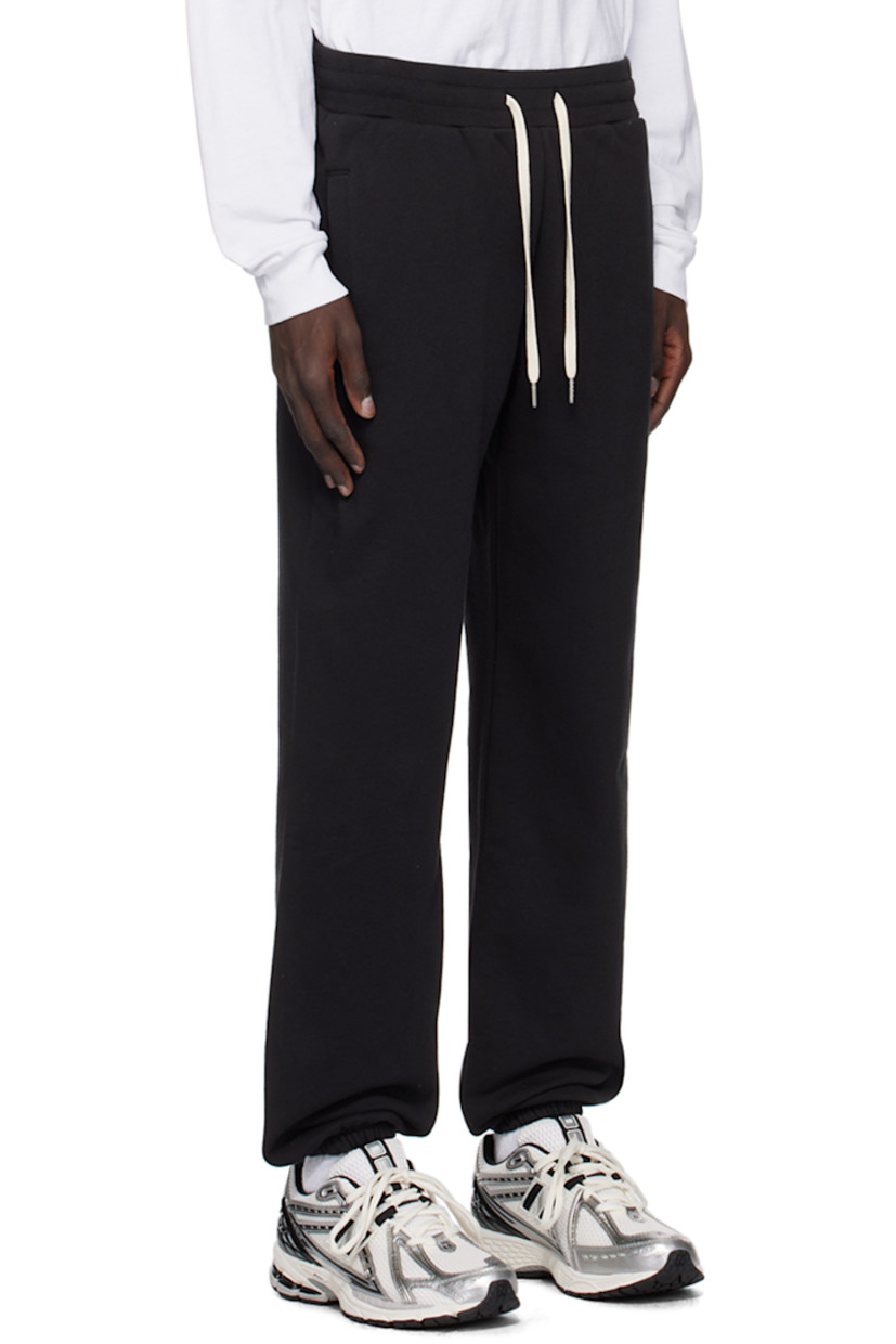 French terry sweatpants.

· Drawstring at elasticized waistband
· Three-pocket styling
· Elasticized cuffs 

Supplier color: Black