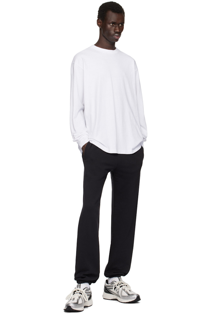 French terry sweatpants.

· Drawstring at elasticized waistband
· Three-pocket styling
· Elasticized cuffs 

Supplier color: Black