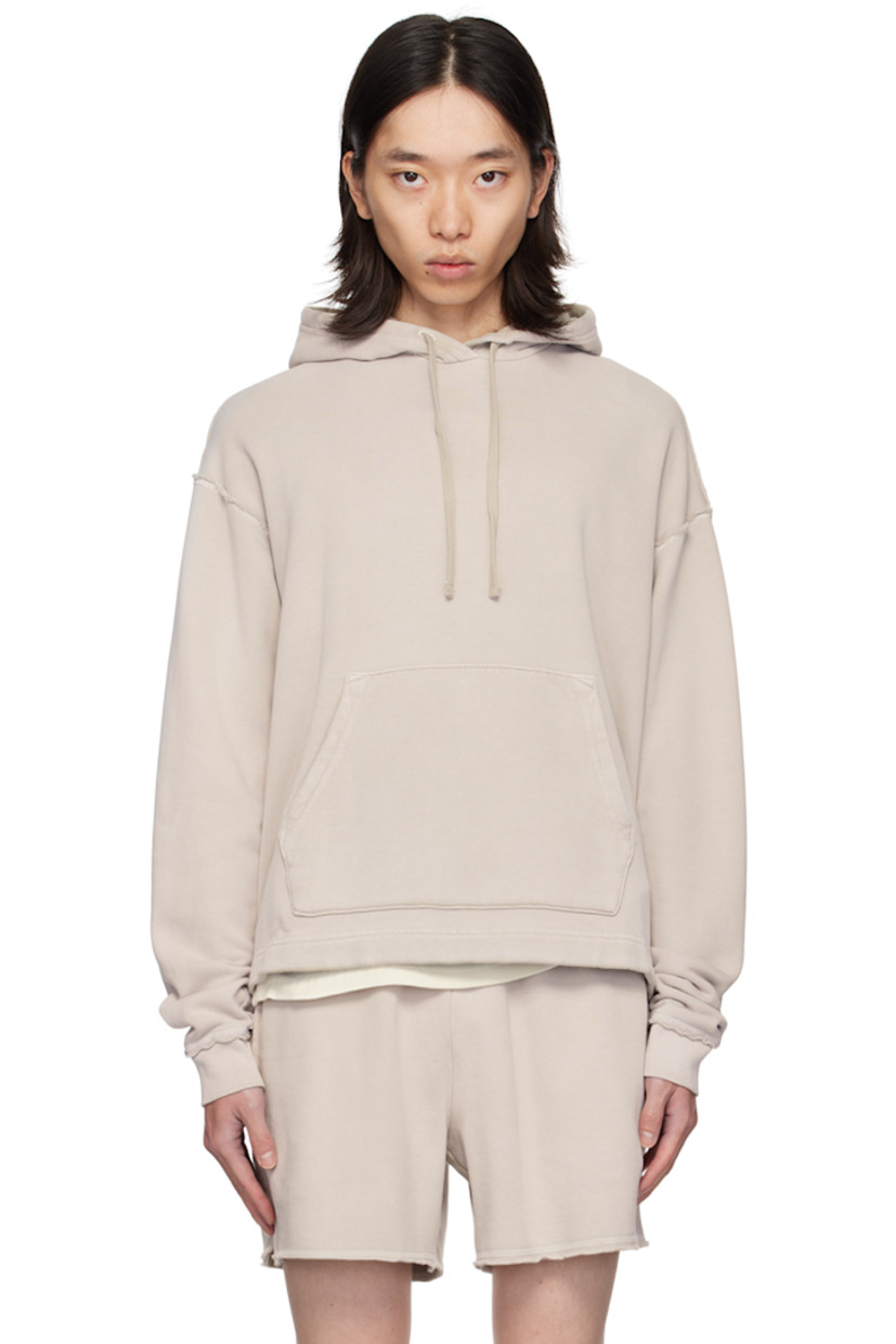 Relaxed-fit cotton fleece hoodie. Raw edges and overlock stitching throughout.

· Drawstring at hood
· Kangaroo pocket
· Dropped shoulders
· Rib knit cuffs
· Contrast stitching in white

Supplier color: Dusty shroom