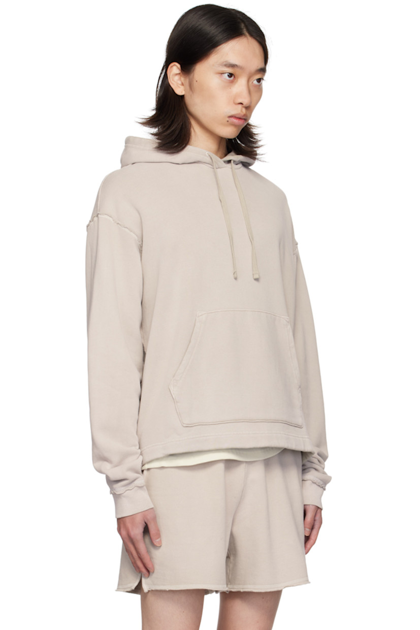 Relaxed-fit cotton fleece hoodie. Raw edges and overlock stitching throughout.

· Drawstring at hood
· Kangaroo pocket
· Dropped shoulders
· Rib knit cuffs
· Contrast stitching in white

Supplier color: Dusty shroom