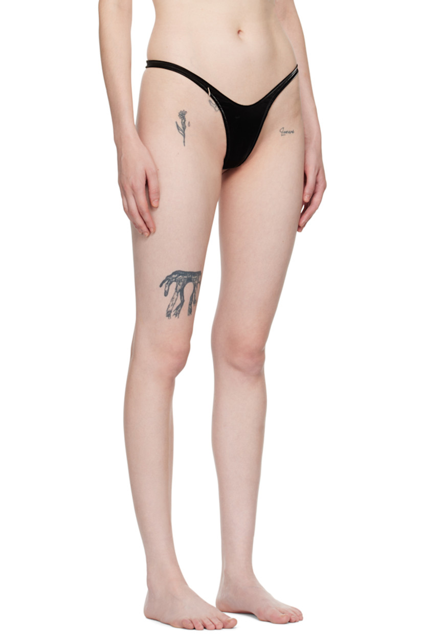 Stretch polyester-blend lamé jersey thong-style bikini bottoms.

· Low-to-high-rise
· Logo plaque at front waistband
· Full stretch nylon jersey lining

Supplier color: Pitch black