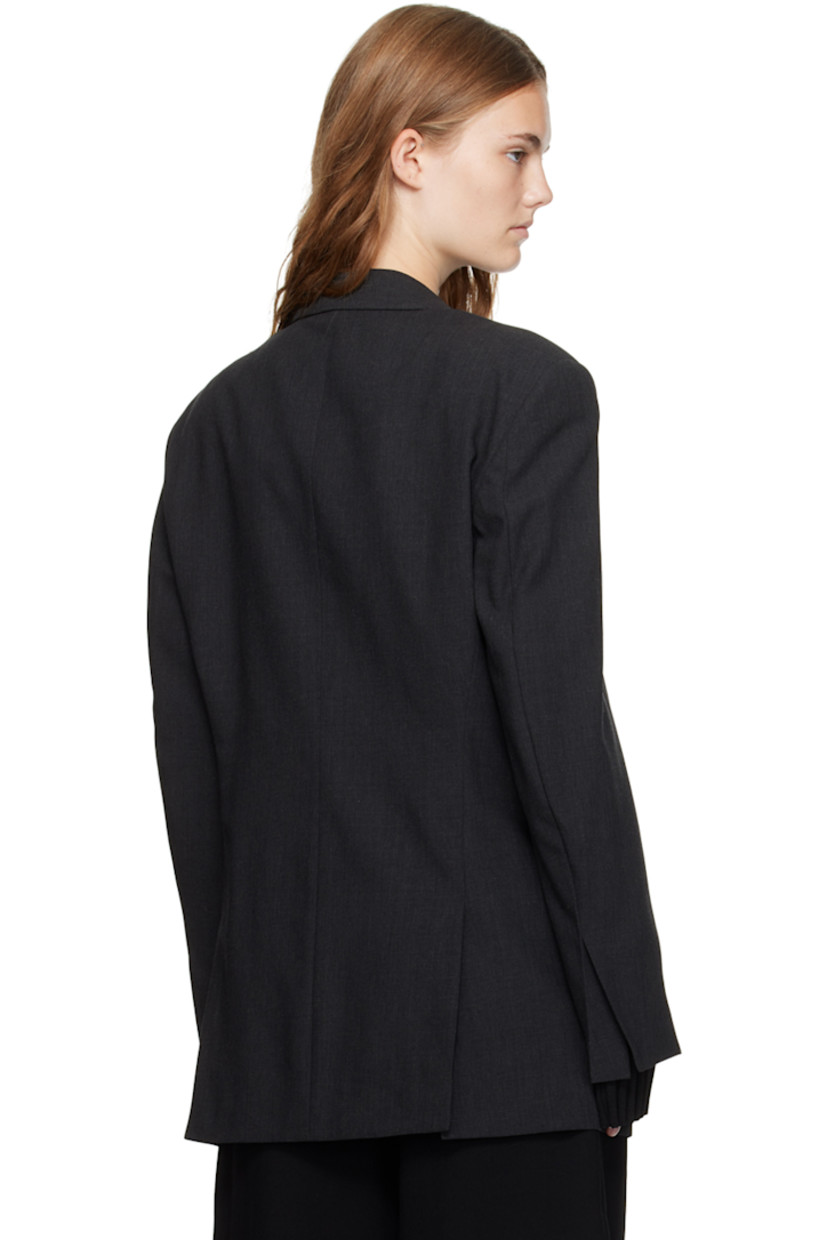 Wool delaine blazer. 

· Peaked lapel
· Double-breasted button closure
· Welt pocket and flap pockets
· Padded shoulders
· Vented cuffs 
· Twin vents at back hem 
· Full satin lining

Supplier color: Charcoal gray