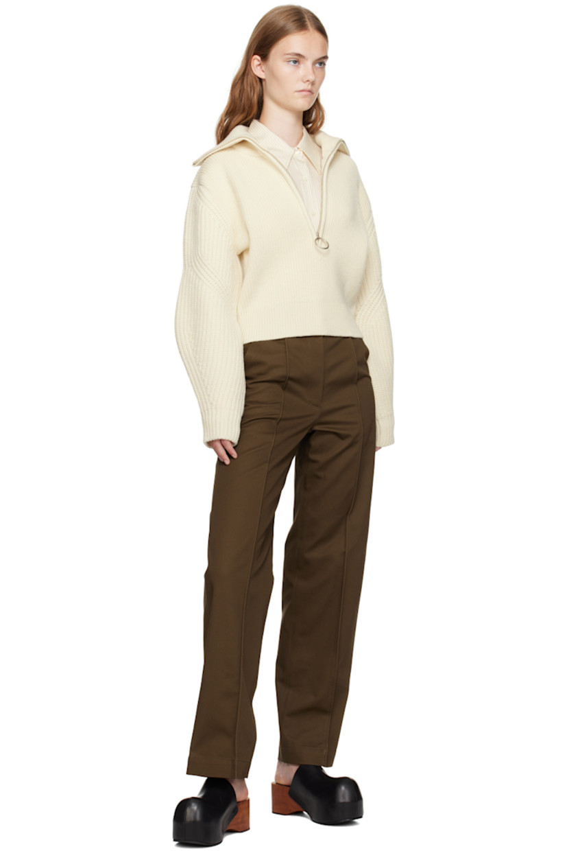 Straight-leg cotton twill trousers.

· Belt loops 
· Three-pocket styling
· Zip-fly
· Pinched seams at legs

Supplier color: Vintage brown