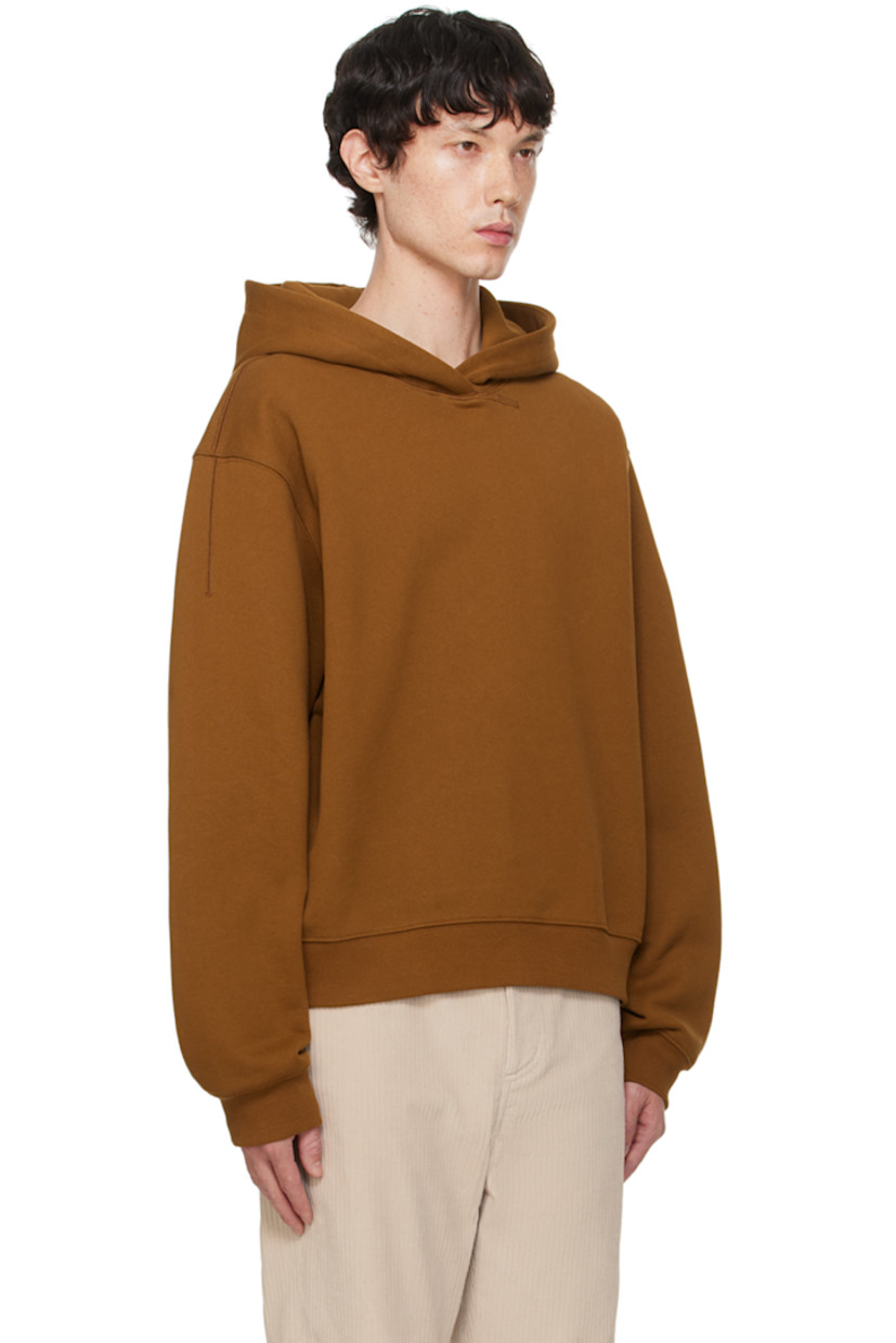 French terry hoodie.

· Rib knit hem and cuffs
· Dropped shoulders
· Logo embroidered at back hem

Supplier color: Brick brown