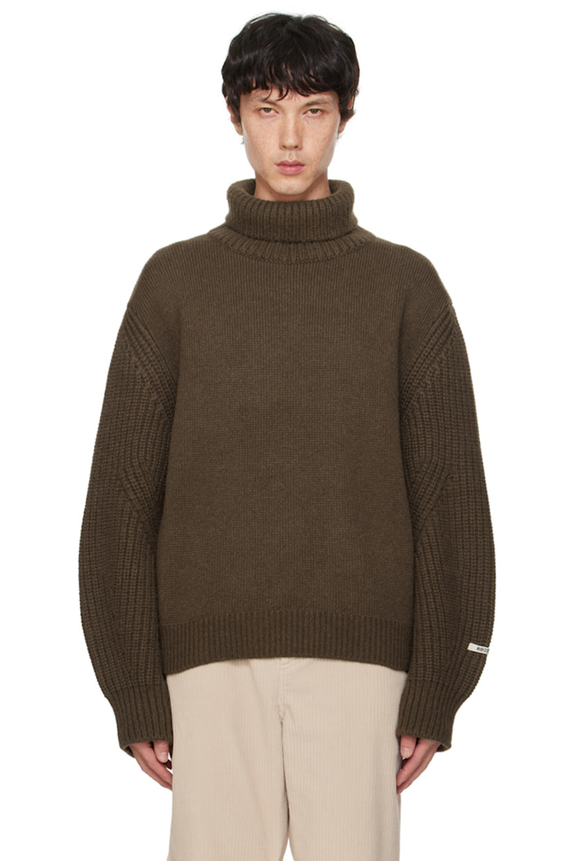Knit nylon- and merino wool-blend turtleneck. 

· Rib knit collar, hem, sleeves, and cuffs
· Dropped shoulders
· Logo patch at sleeve

Supplier color: Khaki brown