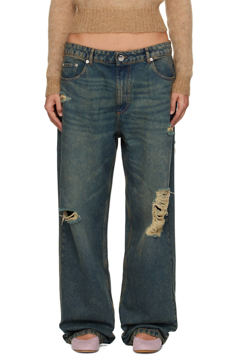 Non-stretch denim jeans. Fading, whiskering, and distressing throughout.

· Belt loops
· Five-pocket styling
· Zip-fly
· Silver-tone hardware
· Contrast stitching in tan

Supplier color: Blue