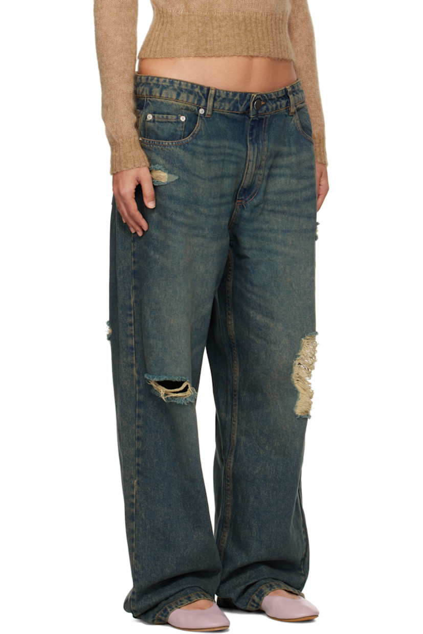 Non-stretch denim jeans. Fading, whiskering, and distressing throughout.

· Belt loops
· Five-pocket styling
· Zip-fly
· Silver-tone hardware
· Contrast stitching in tan

Supplier color: Blue