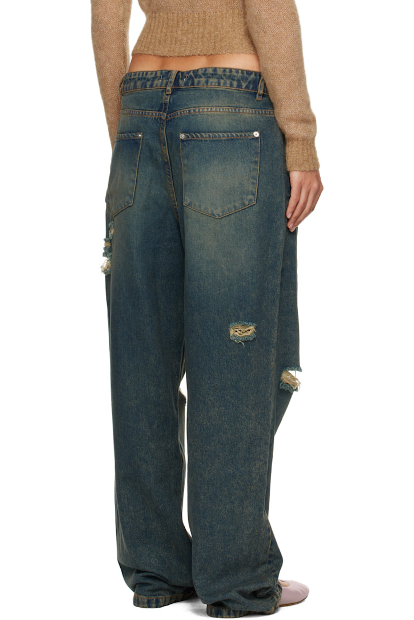 Non-stretch denim jeans. Fading, whiskering, and distressing throughout.

· Belt loops
· Five-pocket styling
· Zip-fly
· Silver-tone hardware
· Contrast stitching in tan

Supplier color: Blue
