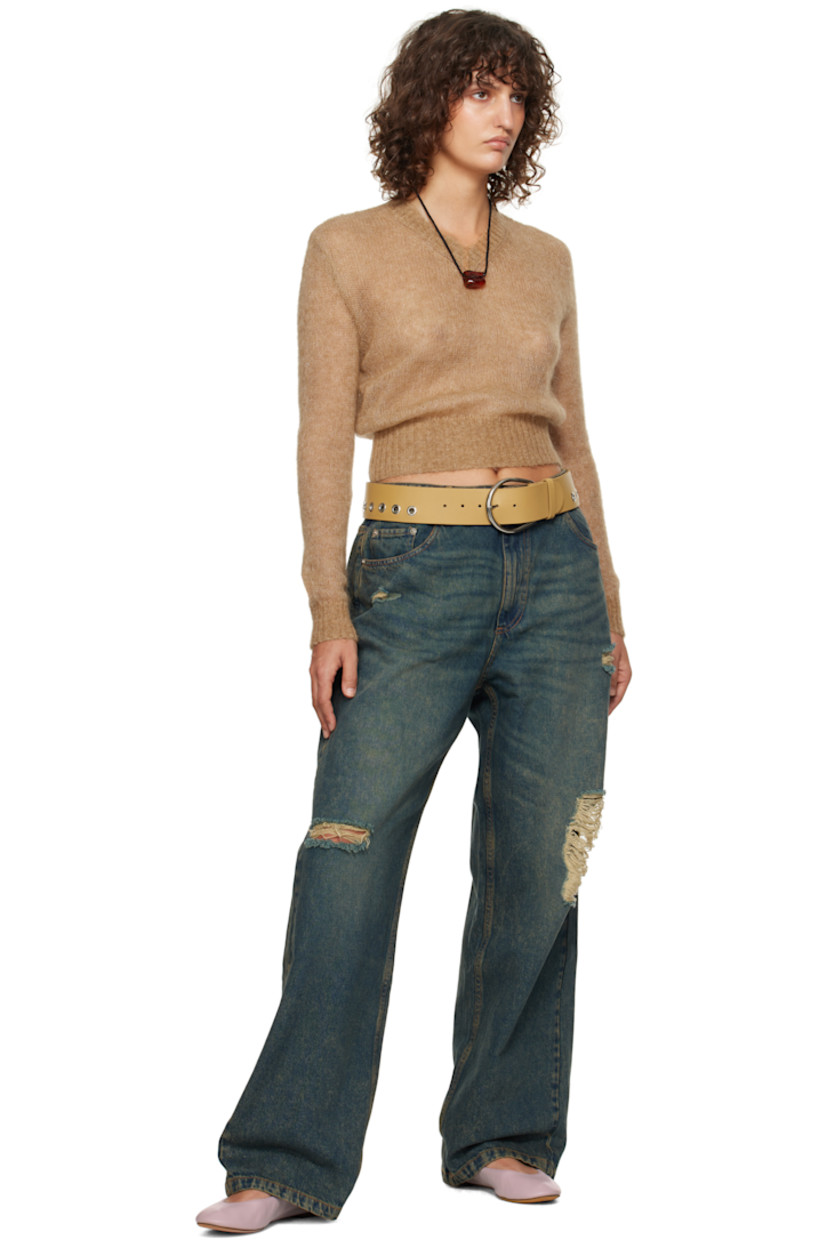 Non-stretch denim jeans. Fading, whiskering, and distressing throughout.

· Belt loops
· Five-pocket styling
· Zip-fly
· Silver-tone hardware
· Contrast stitching in tan

Supplier color: Blue