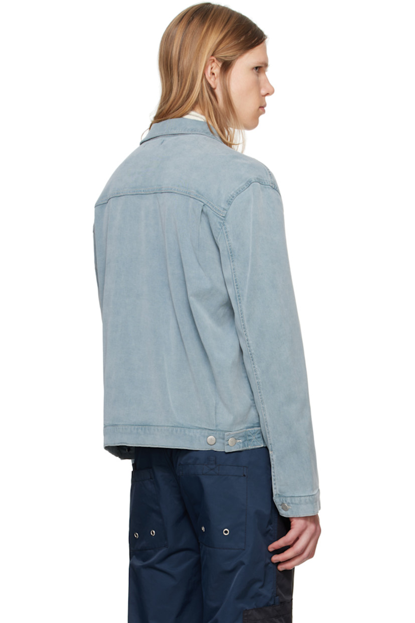 Stretch tencel- and cotton-blend denim jacket. Fading throughout.

· Spread collar
· Button closure
· Flap and welt pockets
· Single-button barrel cuffs
· Adjustable button tabs at back hem
· Silver-tone hardware
· Contrast stitching in white

Supplier color: Blue