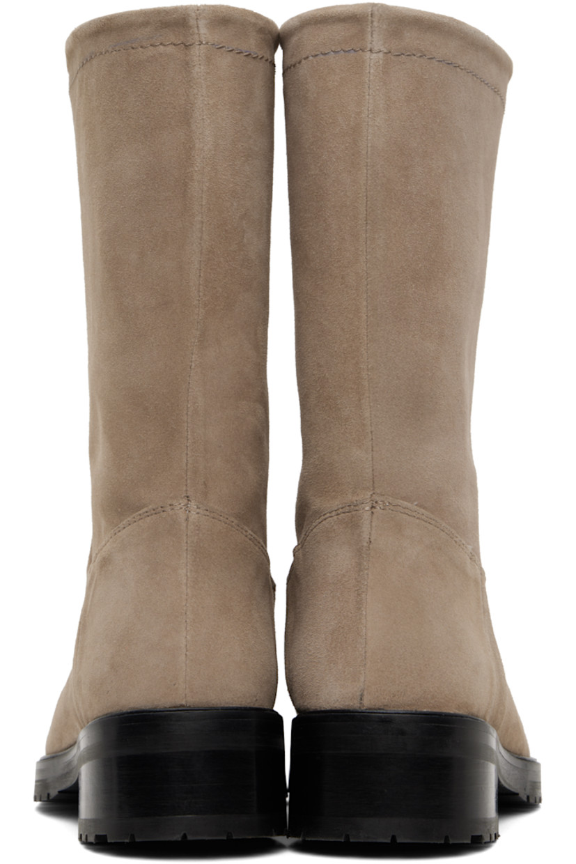 Mid-calf suede boots in taupe.

· Square toe
· Buffed leather lining
· Stacked leather block heel and midsole
· Treaded rubber sole
· Heel: H1.75"

Supplier color: Cumin
