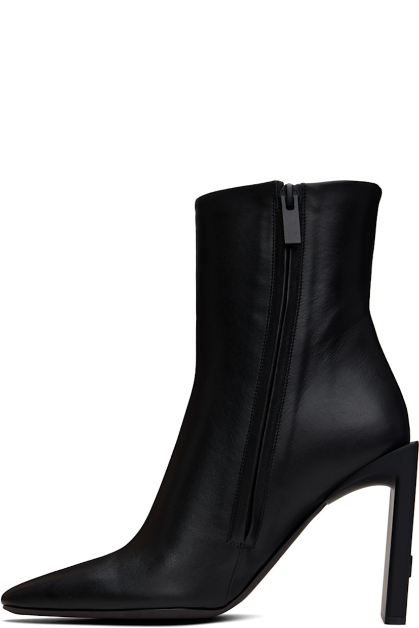 Ankle-high buffed calfskin boots in black.

· Pointed toe
· Zip closure at inner side 
· Buffed leather lining 
· Rubberized logo patch at heel
· Stacked block heel with rubber injection
· Leather sole with rubber injection
· Heel: H4"

Supplier color: Black