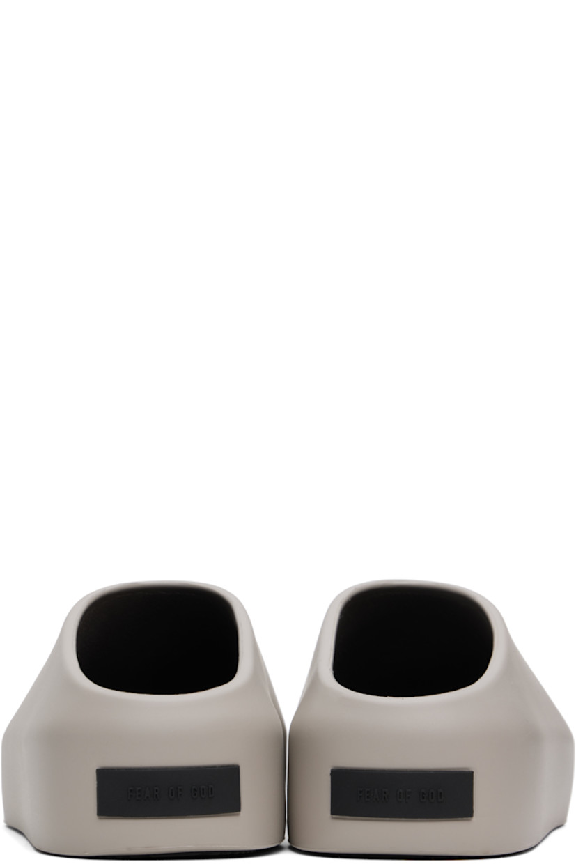 Foam rubber slip-on loafers in gray.

· Rubberized logo patch at heel counter
· Removable logo-embossed buffed leather insole
· Extrabounce foam rubber midsole
· Treaded XL Extralight® rubber outsole

Supplier color: Concrete