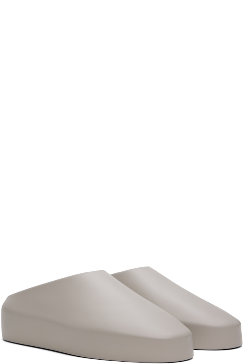 Foam rubber slip-on loafers in gray.

· Rubberized logo patch at heel counter
· Removable logo-embossed buffed leather insole
· Extrabounce foam rubber midsole
· Treaded XL Extralight® rubber outsole

Supplier color: Concrete