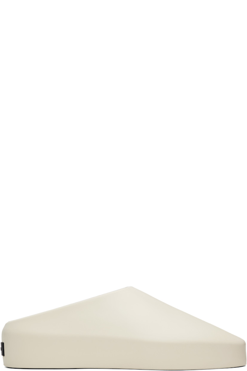 Foam rubber slip-on loafers in beige.

· Rubberized logo patch at heel counter
· Removable logo-embossed buffed leather insole
· Extrabounce foam rubber midsole
· Treaded XL Extralight® rubber outsole

Supplier color: Greige