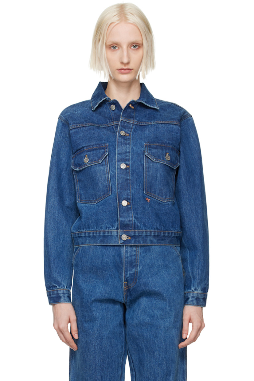 Non-stretch denim jacket. Fading throughout.

· Spread collar 
· Button closure 
· Flap pockets
· Logo embroidered at front
· Single-button barrel cuffs
· Logo patch at back collar
· Twin pleats at back yoke
· Adjustable button tabs at back waistband
· Contrast stitching in tan
· Logo-engraved silver-tone hardware

Supplier color: Blue