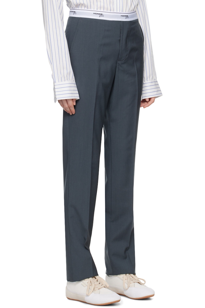 Wool twill trousers. 

· Logo-woven elasticized waistband 
· Four-pocket styling 
· Button-fly 
· Creased legs
· Zip closure at outseam 
· Unlined 

Supplier color: Gray