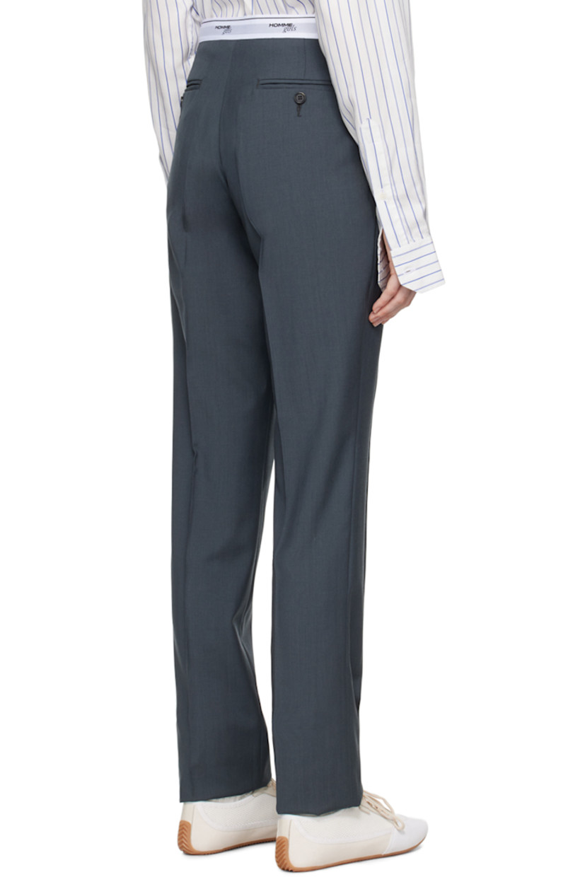 Wool twill trousers. 

· Logo-woven elasticized waistband 
· Four-pocket styling 
· Button-fly 
· Creased legs
· Zip closure at outseam 
· Unlined 

Supplier color: Gray