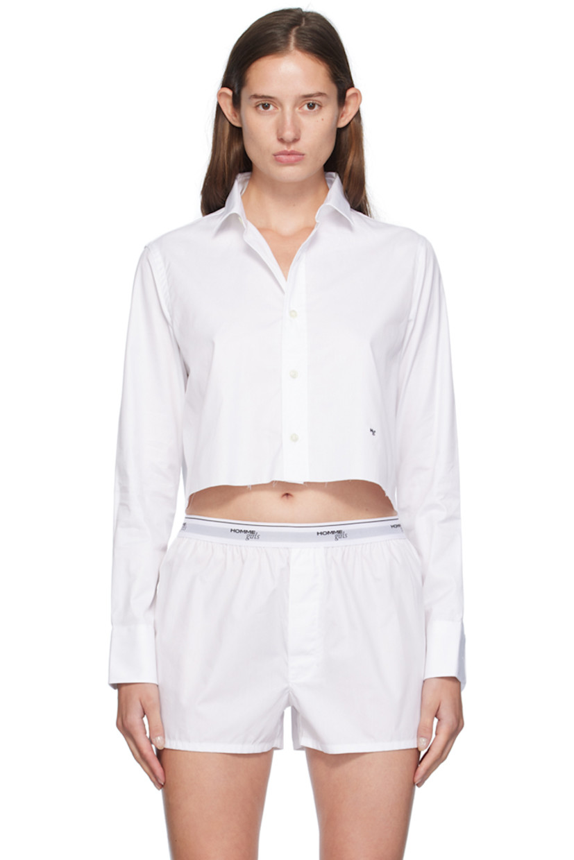 Cotton twill shirt. 

· Spread collar
· Button closure
· Logo embroidered at front
· Raw edge at cropped hem
· Adjustable single-button barrel cuffs
· Box pleat at back yoke

Supplier color: White