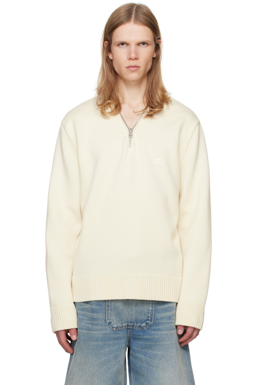 Knit merino wool sweater. 

· V-neck 
· Zip closure at collar
· Embroidered logo patch at chest 
· Rib-knit hem and cuffs
· Silver-tone hardware 

Supplier color: Natural beige